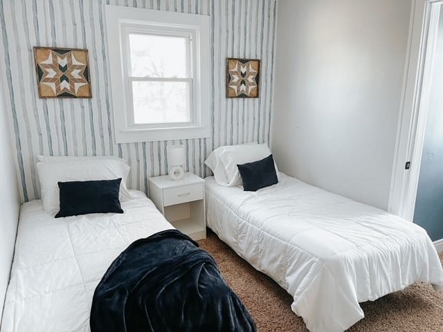 2nd floor bedroom with twin beds and closet