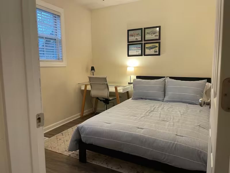 Bedroom 2 with double bed and desk