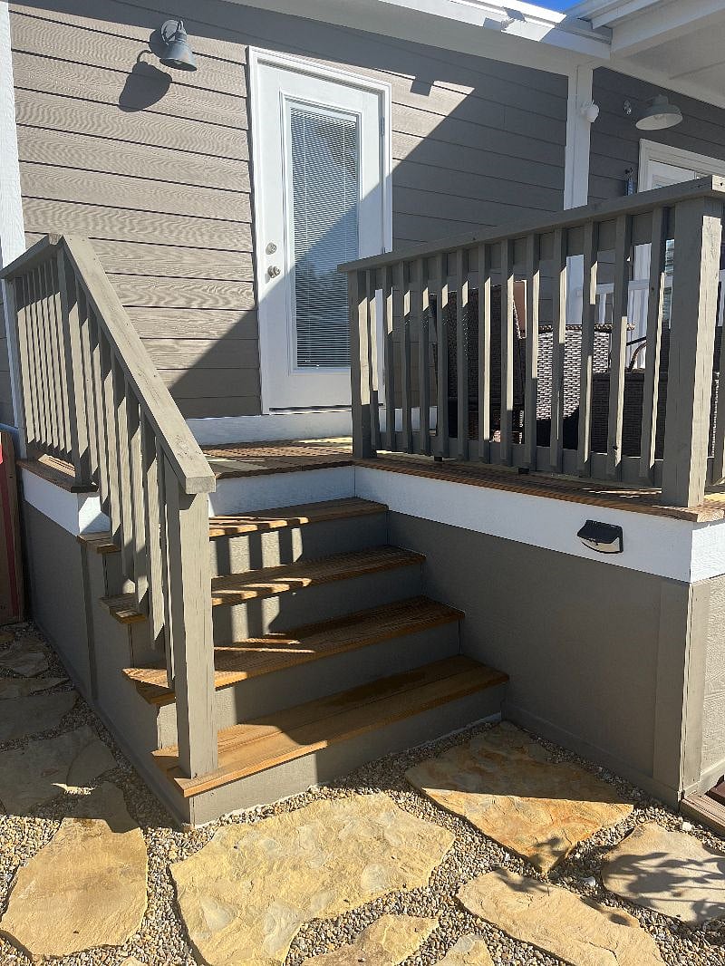 Steps leading to the deck and covered porch