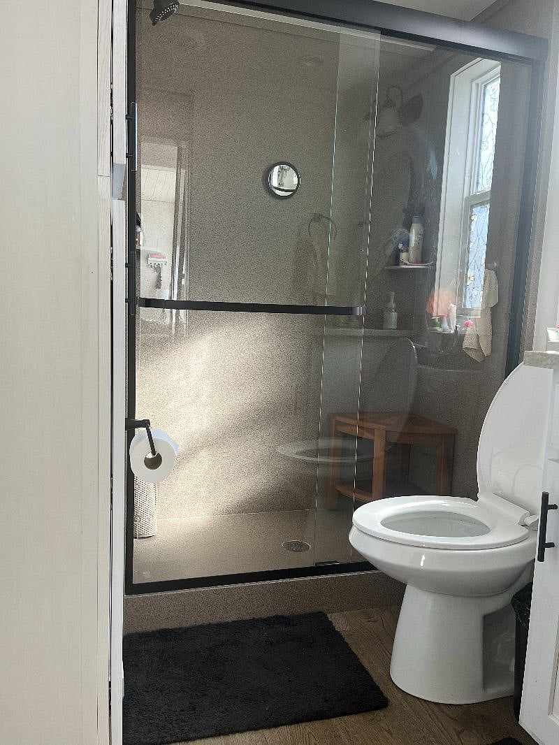 Bathroom shower, no tub.