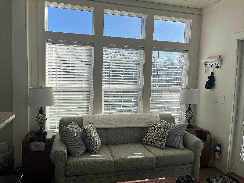 The pull out queen sleeper sofa in the living room