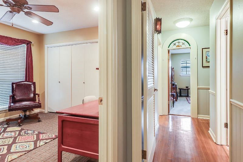 The office is in the front of the house, across the hall from the kitchen