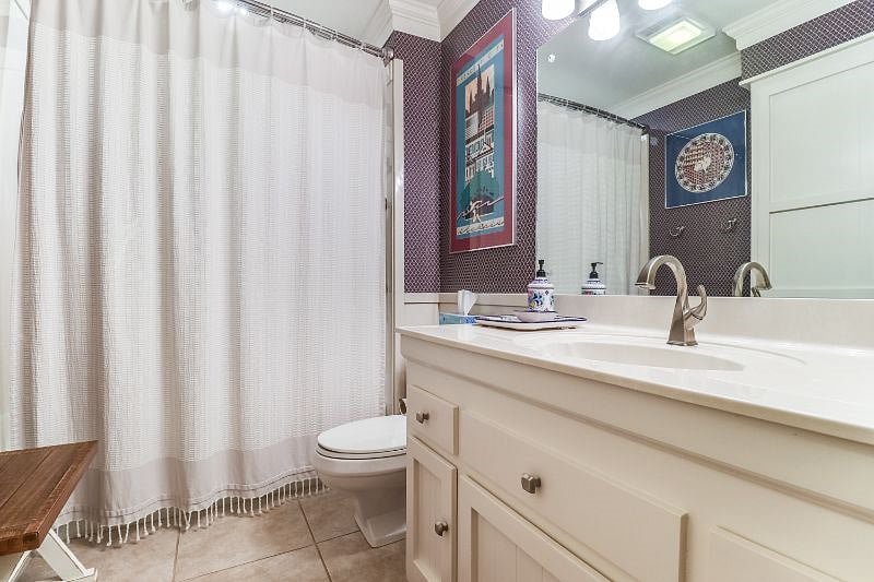Bathroom with newly renovated tub and shower. Good lighting