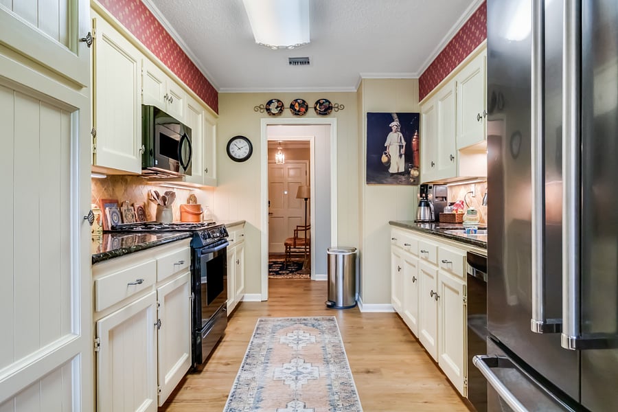 Kitchen looking toward foyer and office