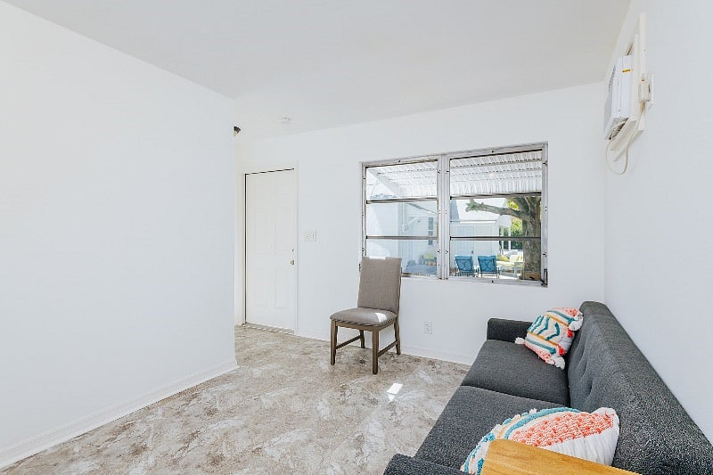 Main living space. Note delivery delay with dinning table and rug 