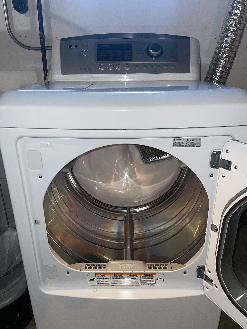 Washer and dryer in basement.