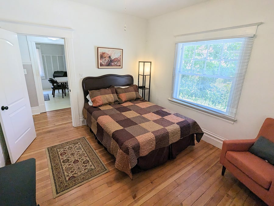 Second bedroom with closet and 2 large windows.