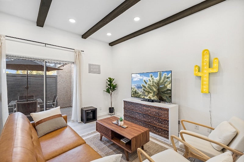 Living room with large HD smart TV.