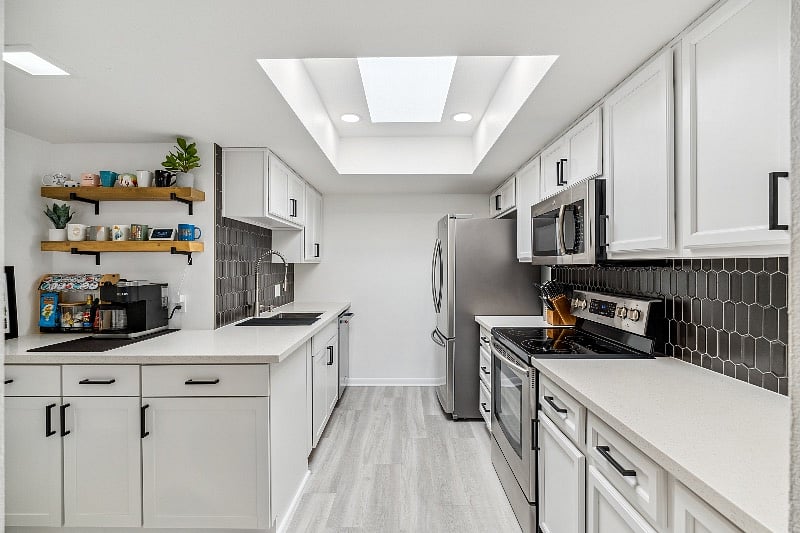 Large newly renovated kitchen with lots of storage and coffee/tea bar.