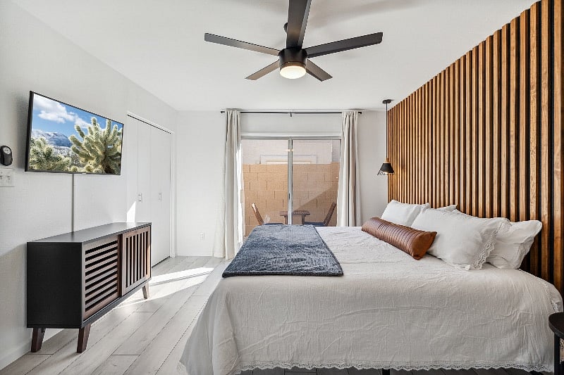 Newly renovated primary bedroom with private outside patio.