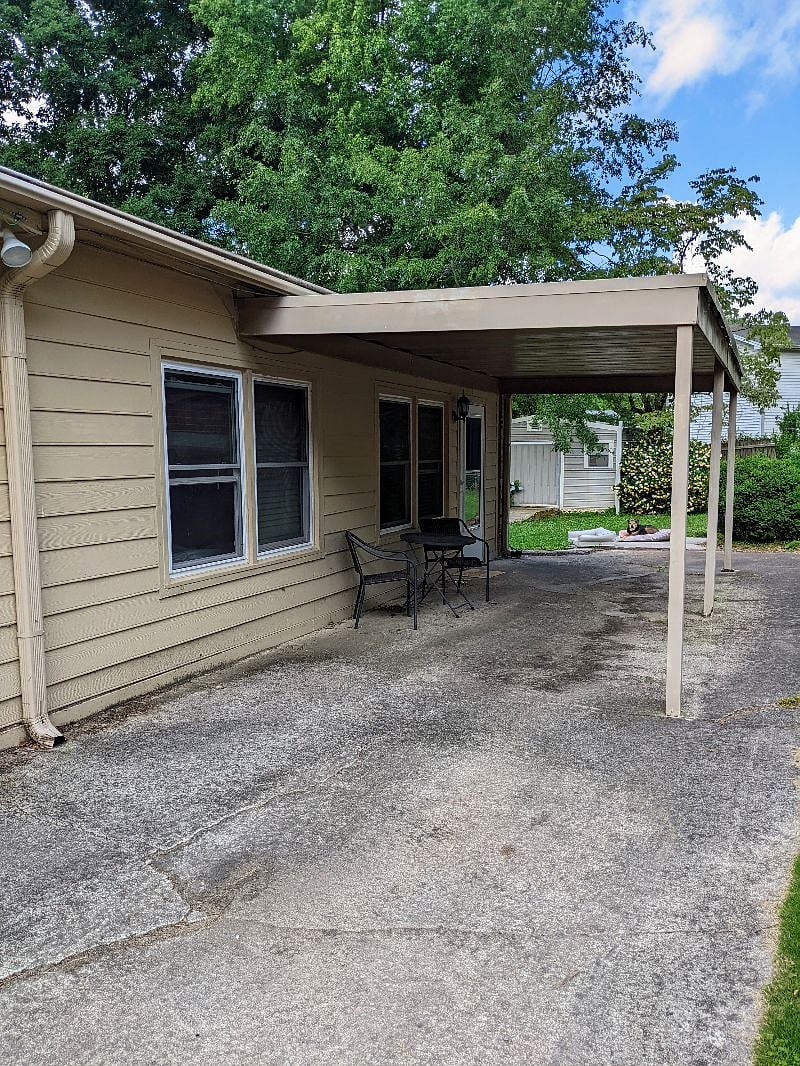 Door to our beautiful guest suite with an awning to cover you while you fumble with the keypad on rainy days!
