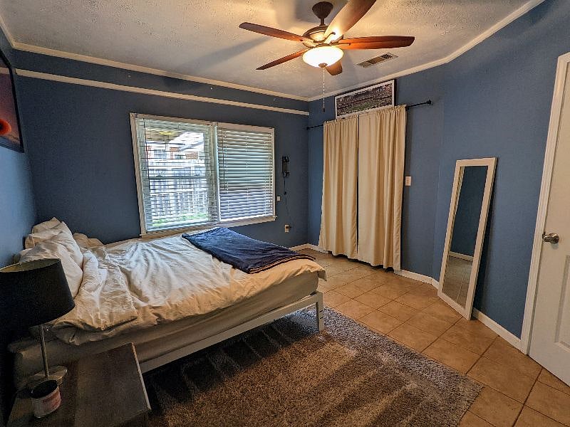 Large and bright bedroom with walk-in closet