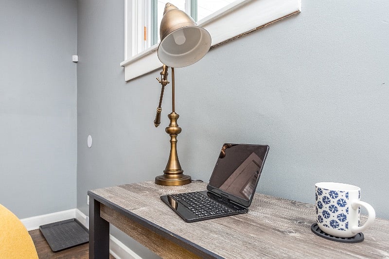 Workspace between the living room and kitchen for answering your important emails.