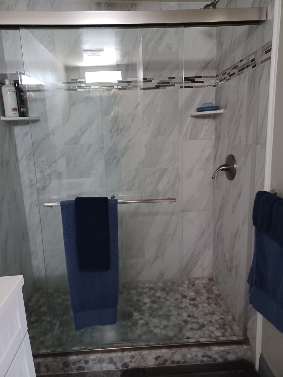 Brand new marble shower with rainwater showehead