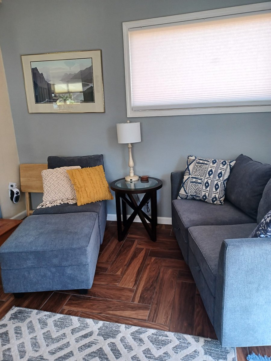 Lounge and sofa both have extra storage underneath. Extra blankets and bedding are stored in the lounge.