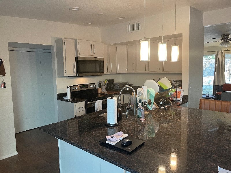 Huge kitchen island and lots of cabinet space.
