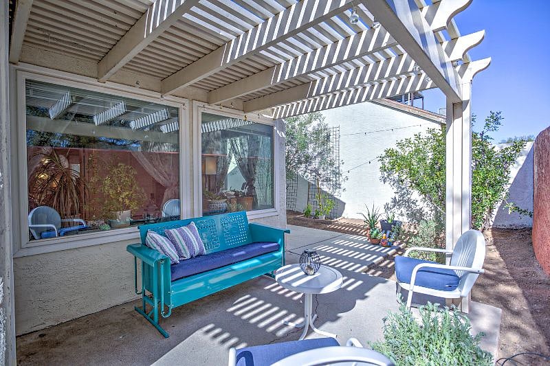 Fully walled patio offering a quiet, private space to relax.