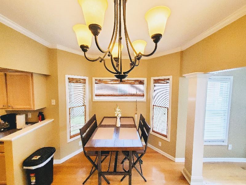 Dining room table doubles a great work space. Seats 4 comfortably.