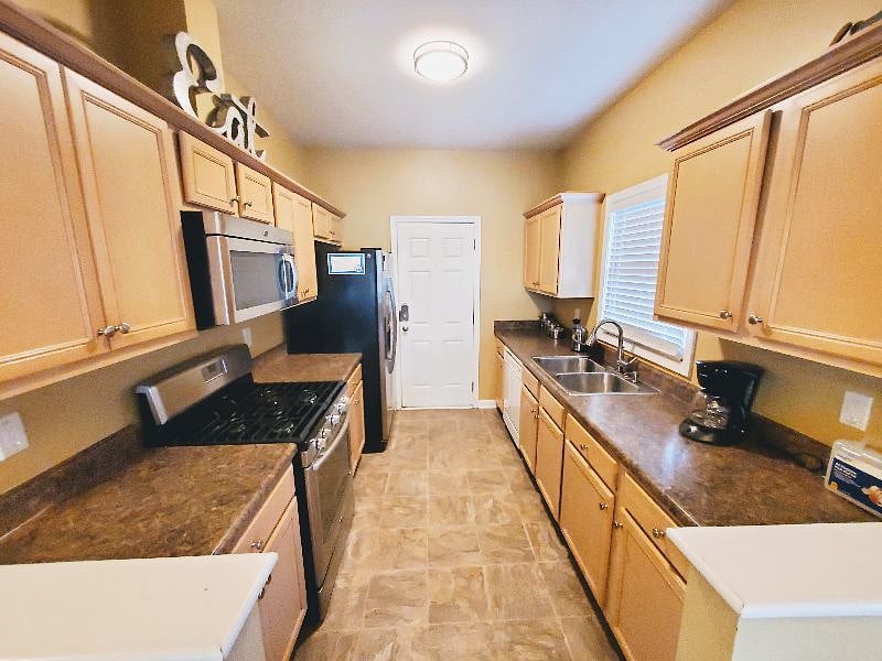 Full kitchen: dishwasher, garbage disposer, gas stove/ oven, microwave, coffee maker, refrigerator, cookware, silverware, etc