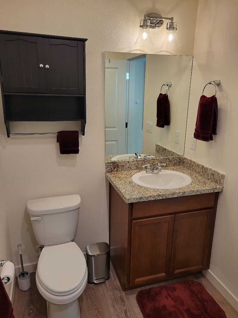 Downstairs bedroom in suite bathroom