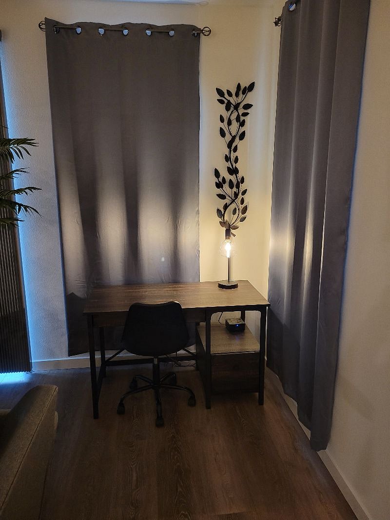 Small workstation. Two windows for natural light.