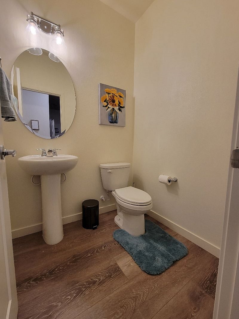1/2 bath across from kitchen in common area