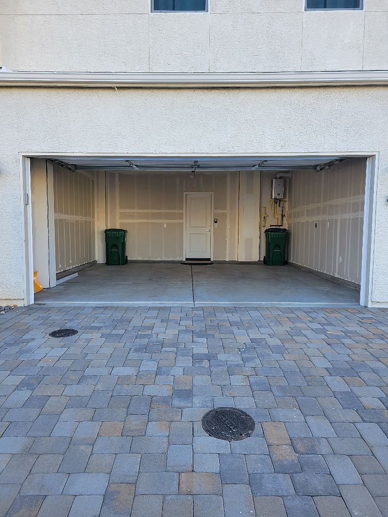 Standard two garage with level 2 EV charger on right side