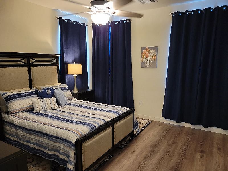 Blackout curtains for day sleepers or lazy, well deserved mornings off. Large screen TV in bedroom with swivel wall mount.