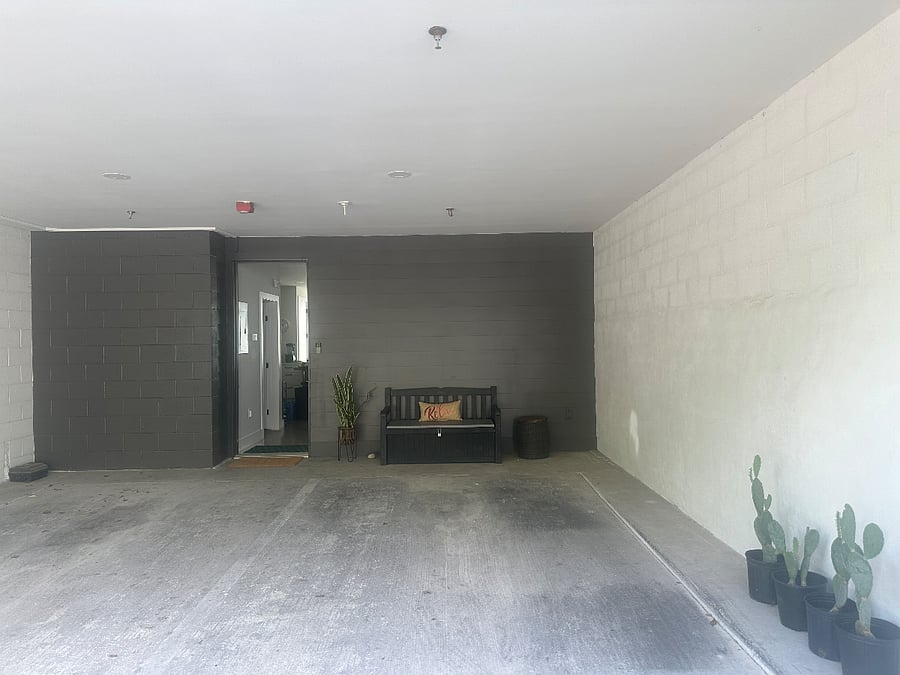 A covered parking spot (on the right, left is your upstairs neighbor) at your front door! Save your car from the Texas heat and hail! A must in Austin. Ring doorbell and camera. Yale digital lock.