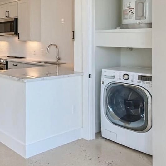 All in one washer/dryer combo which is great for small loads of laundry. Bulky items and pet hair car seat covers etc can be taken to the SPIN laundromat on Congress Ave next to the HEB.