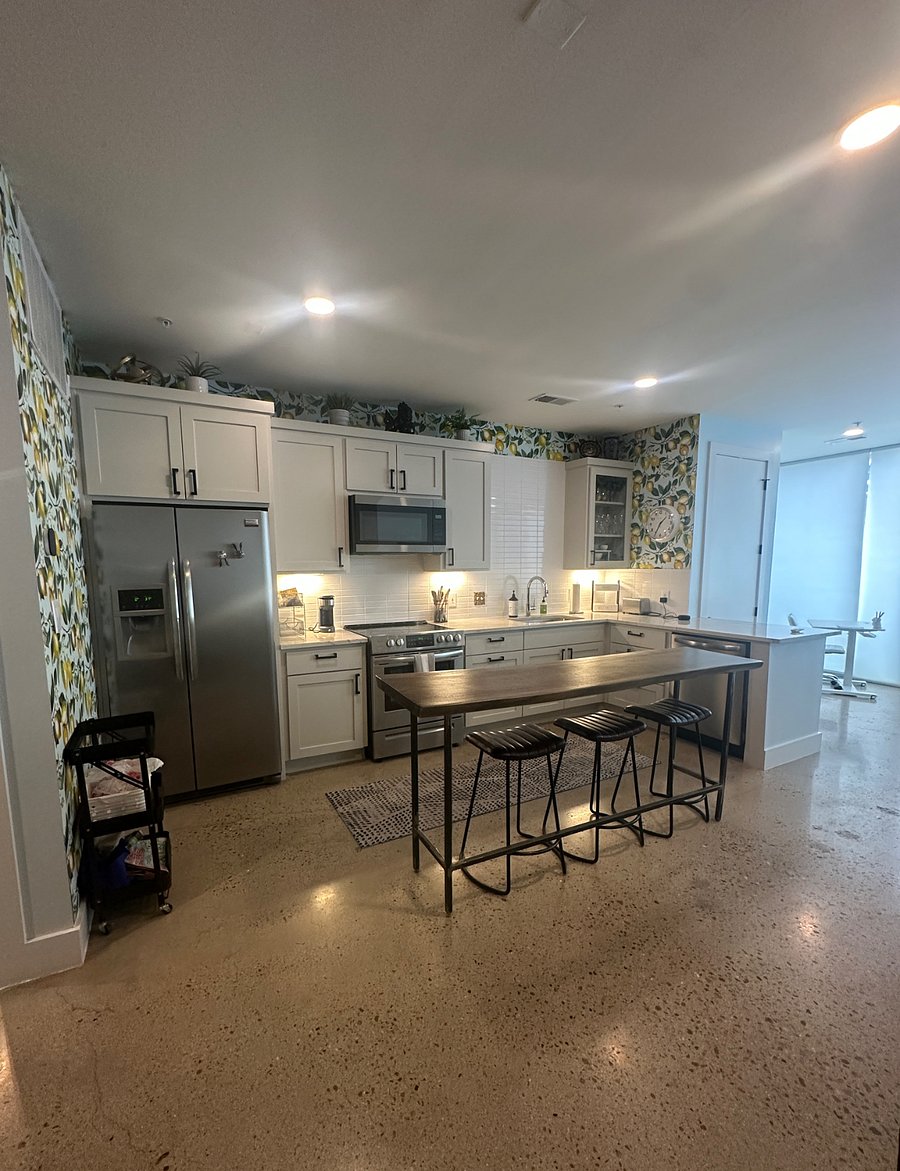 Im removed the wallpaper and used it inside the kitchen cabinets as contact paper and backsplash color.