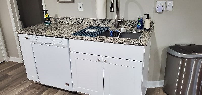 Large single basin undermount sink with drying rack and dishwasher