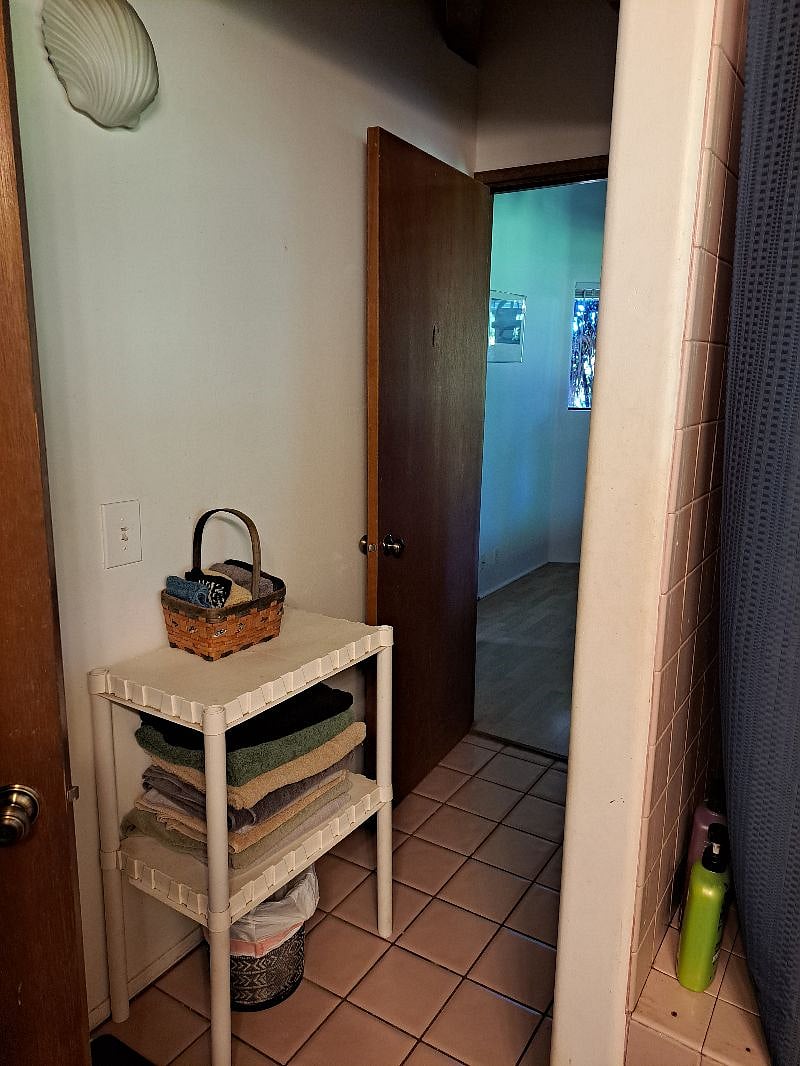 Entrance to open bedroom from the shared bathroom