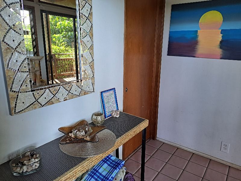 Entrance to the house with available bedroom on the left