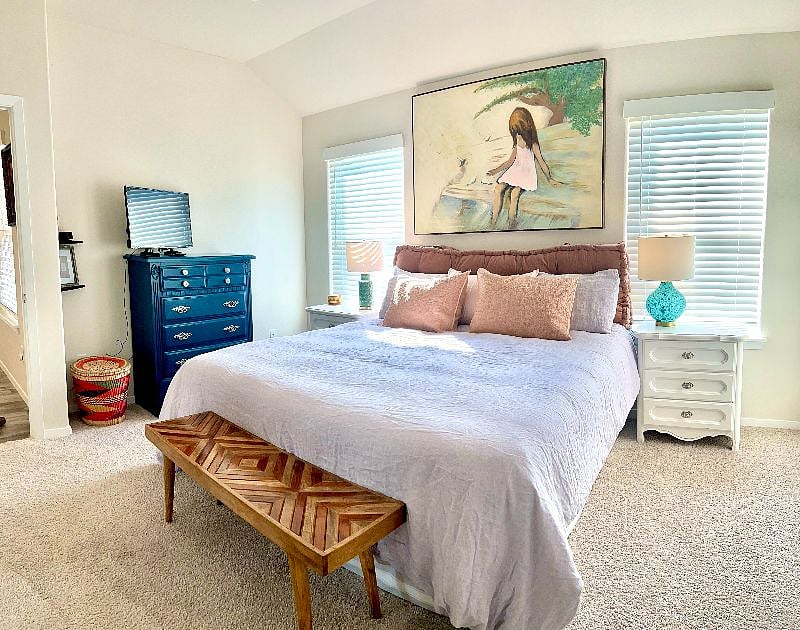 primary bedroom with king bed and roku tv