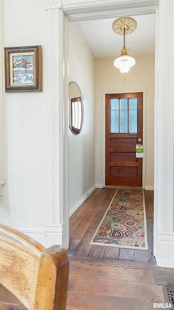 Front door that leads to covered porch.