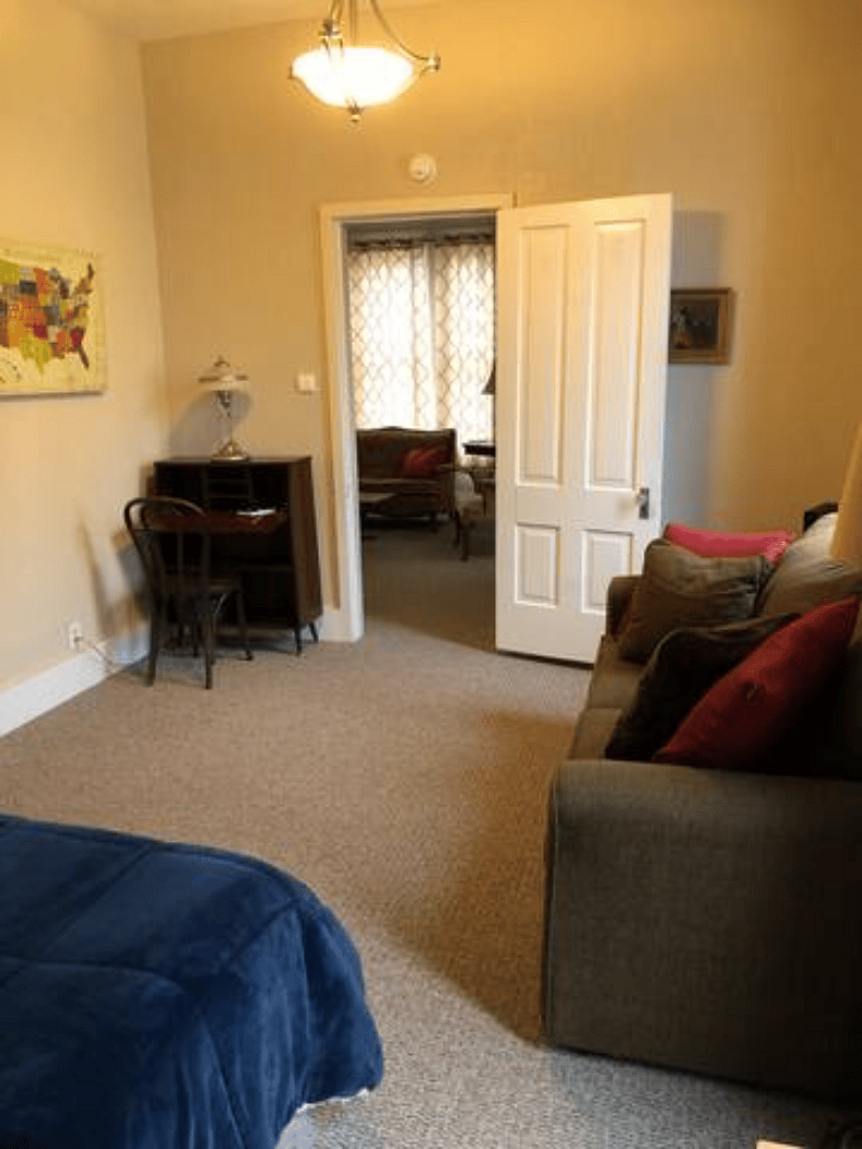 Looking from 2nd bedroom into living room. Two doors to close off 2nd bedroom - 1 going into dining room, 1 going into living room.
