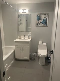 Wheel chair accessible bathroom with modern fixtures.
