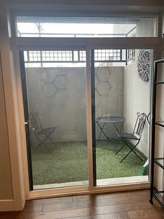 Private patio with premium faux grass to enjoy under your feet.