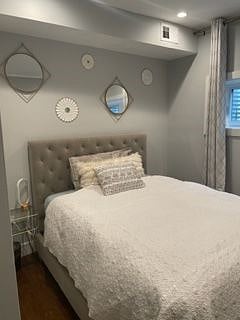 Comfortable queen bed with new sheets for increased comfort.