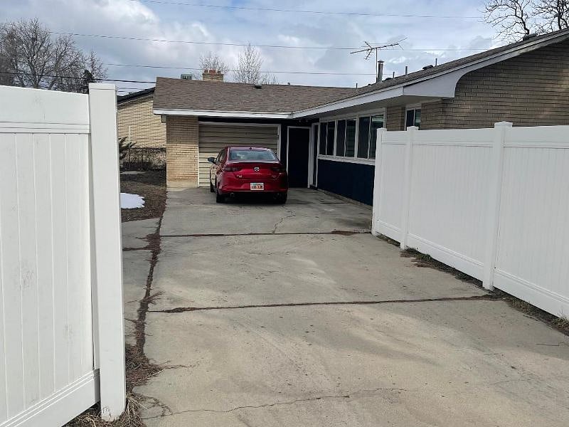 Ample driveway parking garage use may be negotiated.
