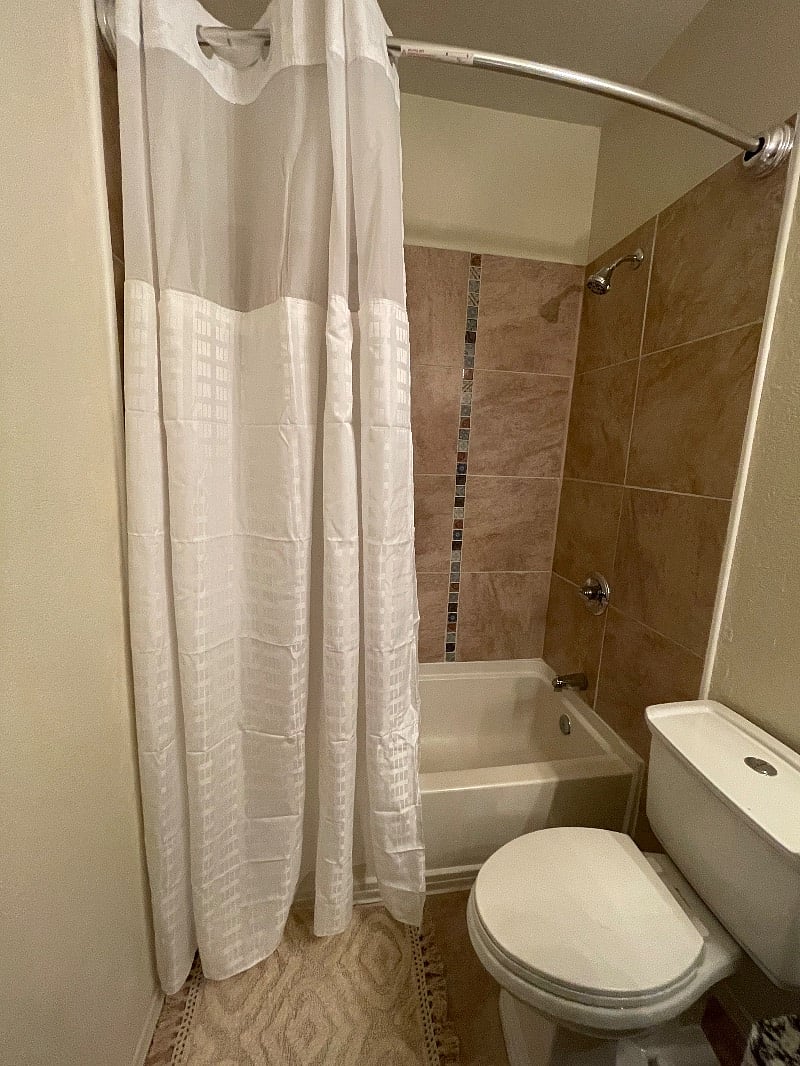 Guest Bathroom. 1 Sink, shower/tub combo, toilet, blow dryer