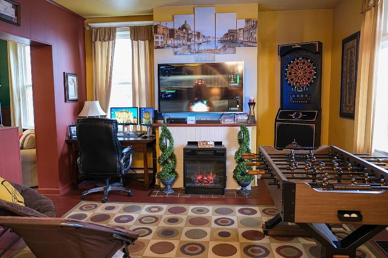 Entertainment Room is designed for easy access. This room is equipped with an Electronic Dart Board, Foosball Table and a PS2 with over twenty different games.
