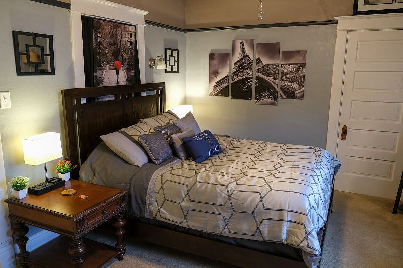 Queen size mattress with charging lamps located on either side of the bed.