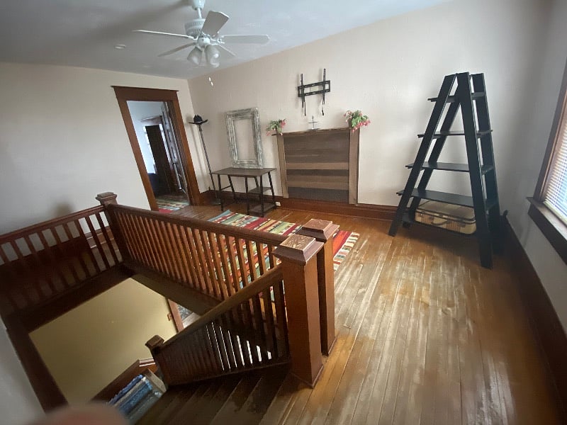 Landing to the two upstairs bedrooms. Lots of space in the upstairs of this renovated farmhouse
