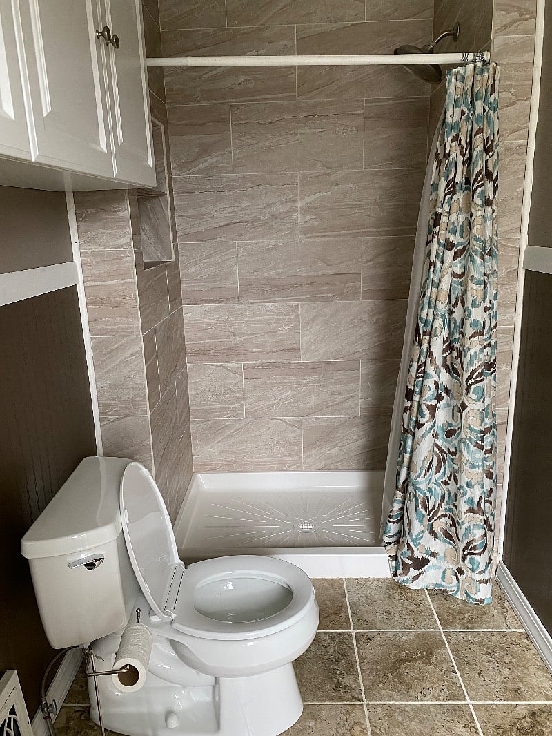 Tiled shower and 2nd Floor bathroom, adjacent to 2 bedrooms