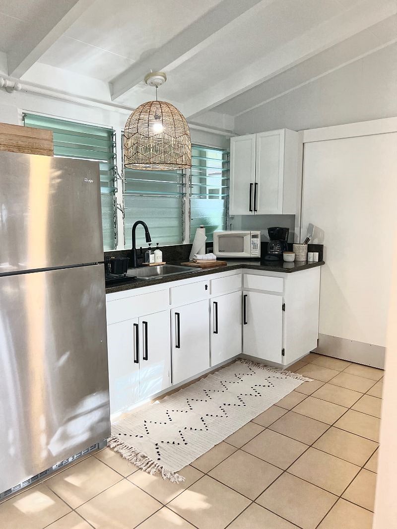 Fully stocked kitchen with full size refrigerator, air fyrer, mircowave, and electric skillet. 