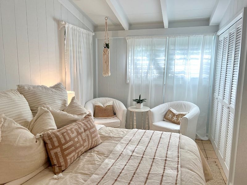 Bedroom with sitting area and additional closet