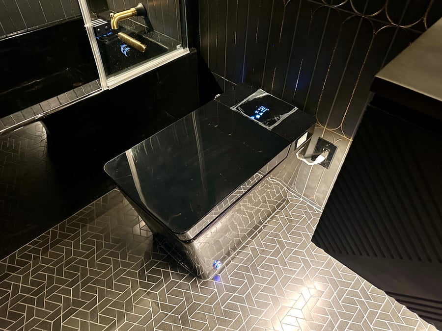 Electronic/automated Japanese bidet. This is not just the toilet seated is the full unit.