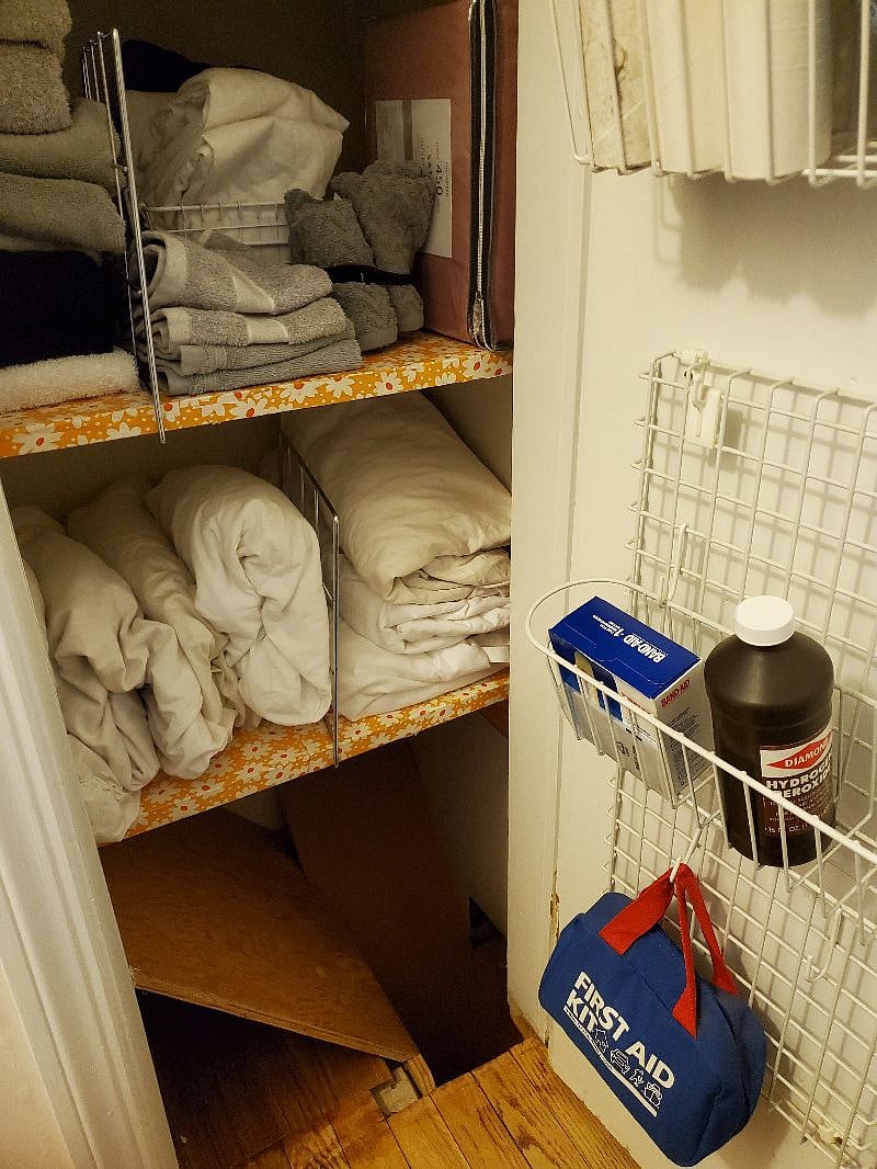 More linen-closet contents. (Additional set of flannel sheets not shown)